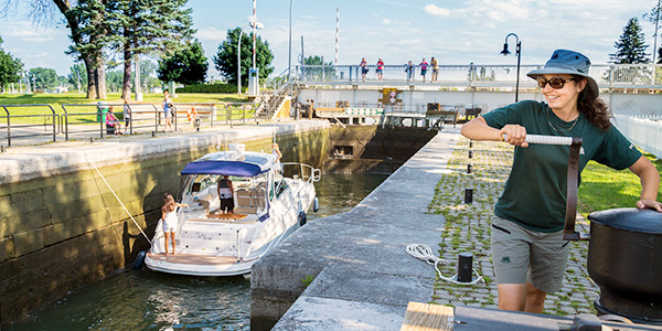 A staff member operating the locks at Chambly Canal National Hisotric Site.